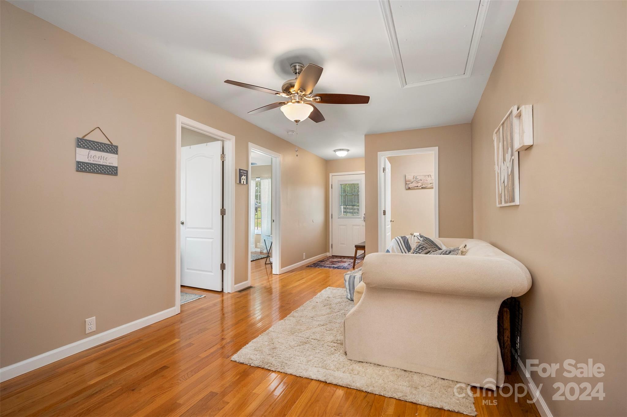 210 Thompson Road Rutherfordton, NC 28139 - Photo 27 of 44 a living room with furniture and a chandelier