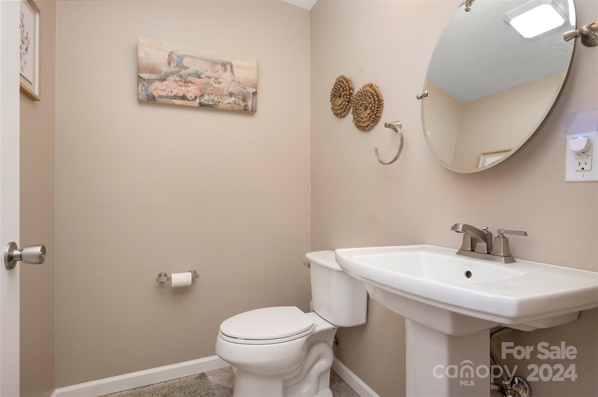 210 Thompson Road Rutherfordton, NC 28139 - Photo 31 of 44 a bathroom with a sink mirror and toilet