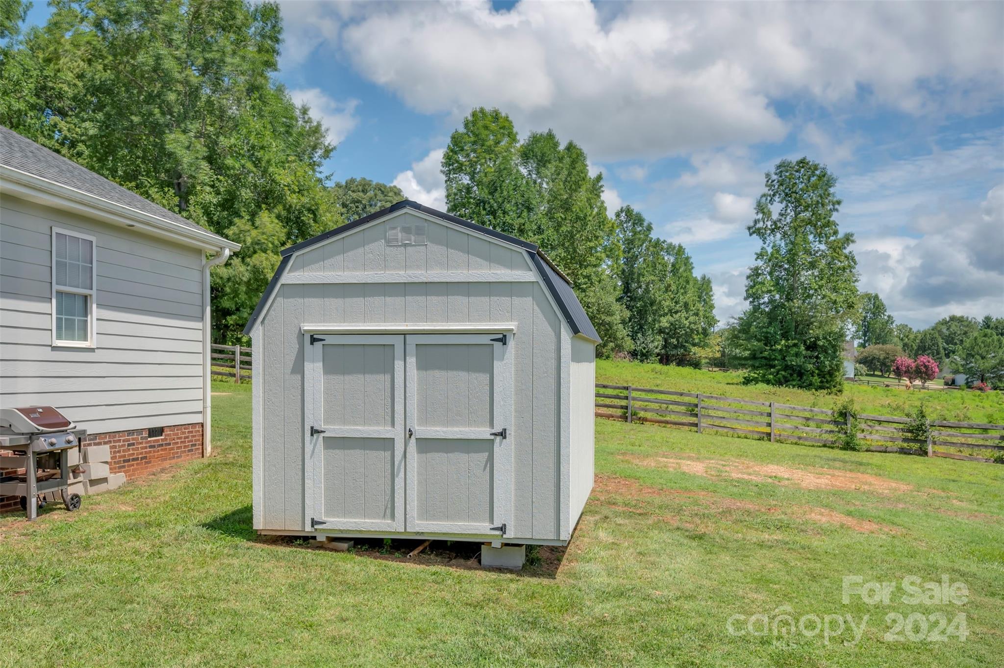 210 Thompson Road Rutherfordton, NC 28139 - Photo 40 of 44 a view of an house with backyard space and garden