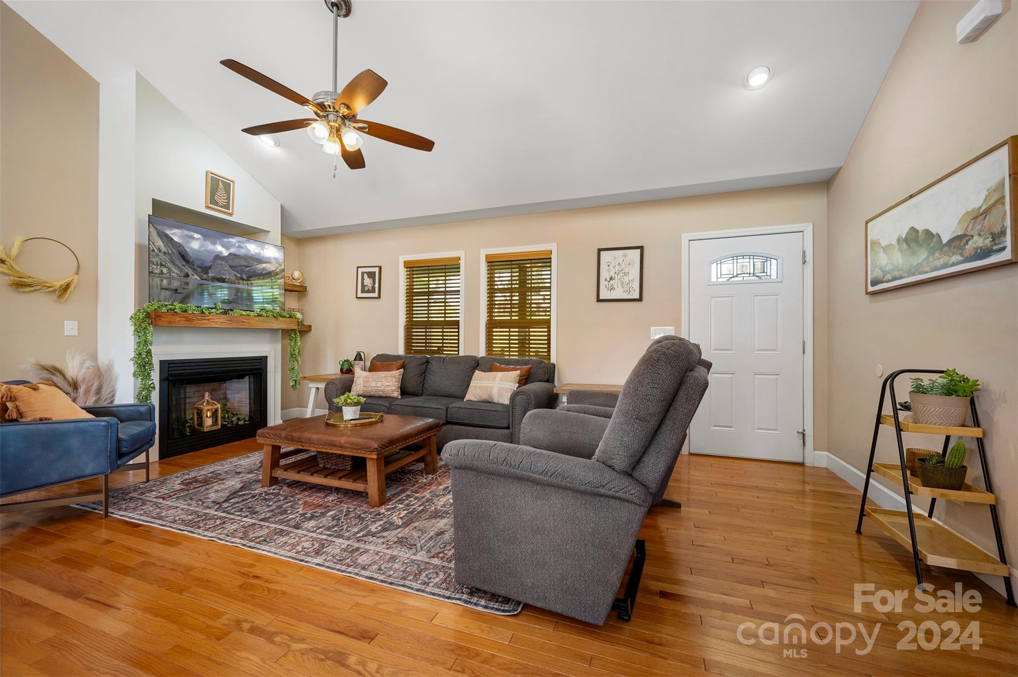 210 Thompson Road Rutherfordton, NC 28139 - Photo 7 of 44 a living room with furniture a window and a fireplace