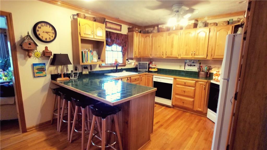 332 Holyoke Road Butler, PA 16001 - Photo 4 of 18 Open concept kitchen/dining area. Also leads to sun room and living room.