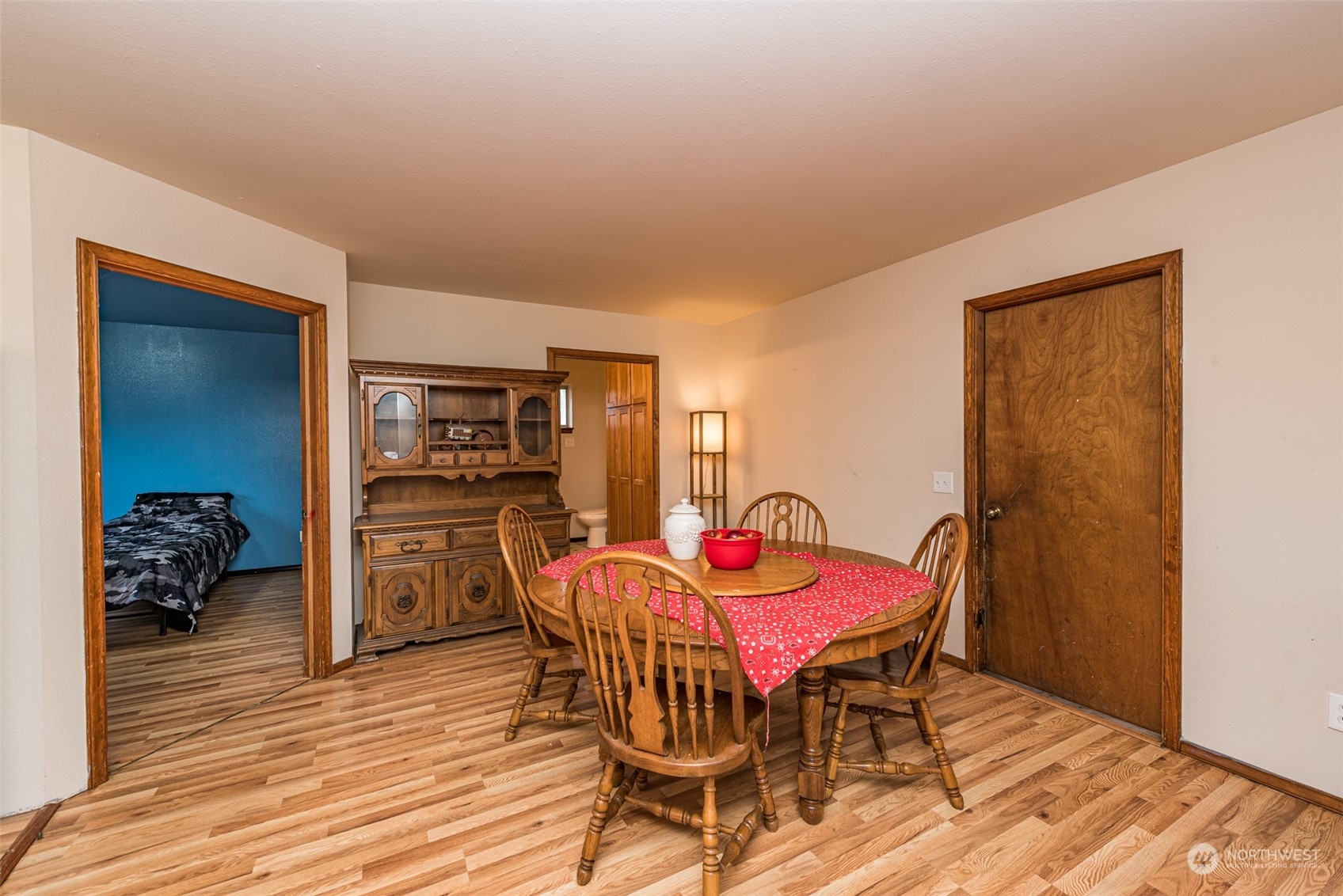 546 North Priest Road Sequim, WA 98382 - Photo 8 of 35 a view of a dining room with furniture and wooden floor