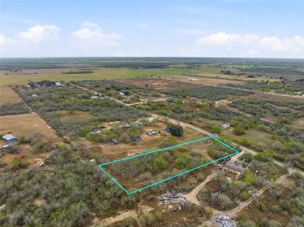 a view of a city with an ocean