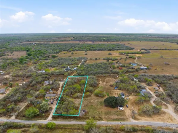 a view of city with ocean