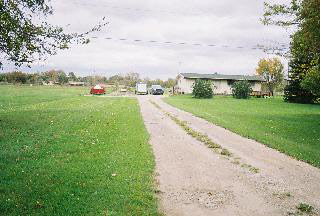 10004 North Ann Arbor Road Maybee, MI 48159 - Photo 6 of 6 sits back from road