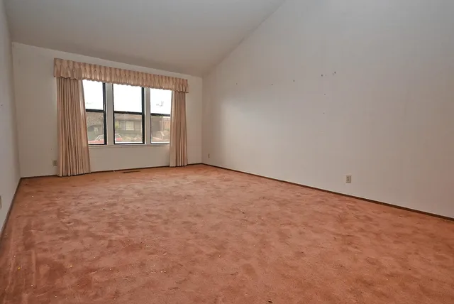 an empty room with a window