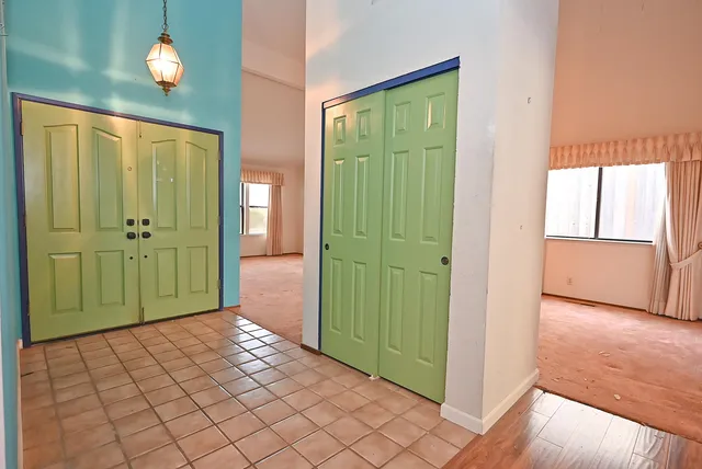 a view of a bathroom with a shower and a sink
