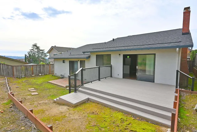 a view of a house with swimming pool