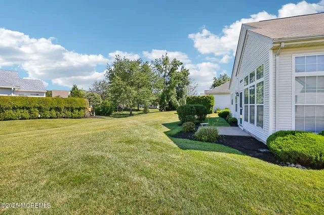 a view of a house with a garden