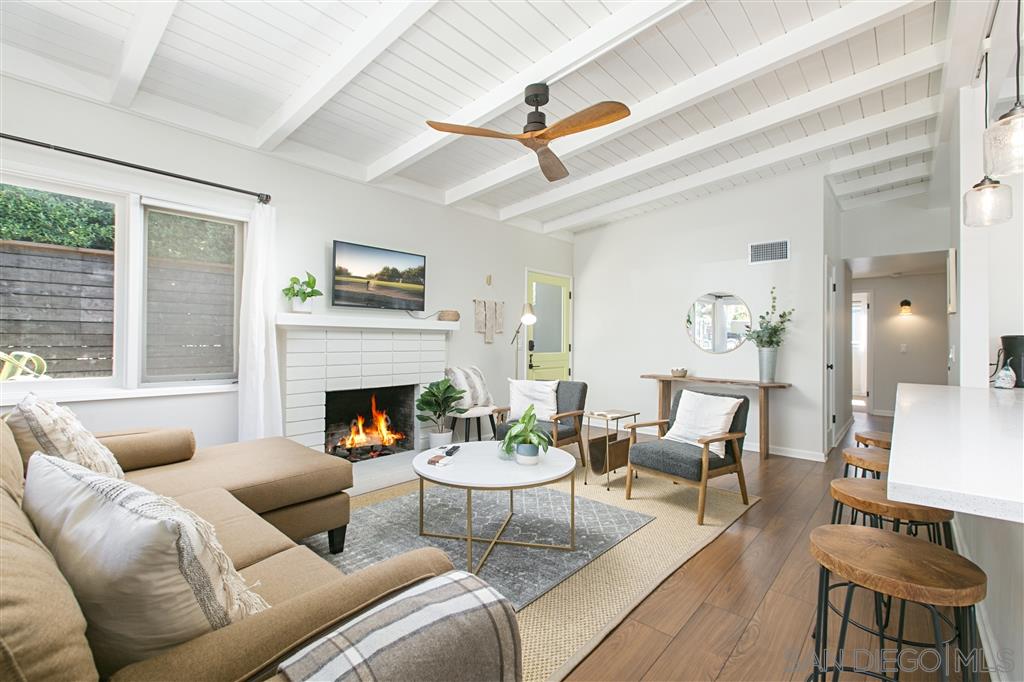 759 Bellevue Place La Jolla, CA 92037 - Photo 1 of 15 a living room with furniture and a fireplace