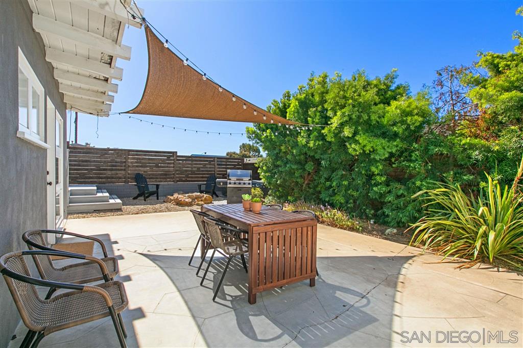 759 Bellevue Place La Jolla, CA 92037 - Photo 11 of 15 a patio with table and chairs and potted plants