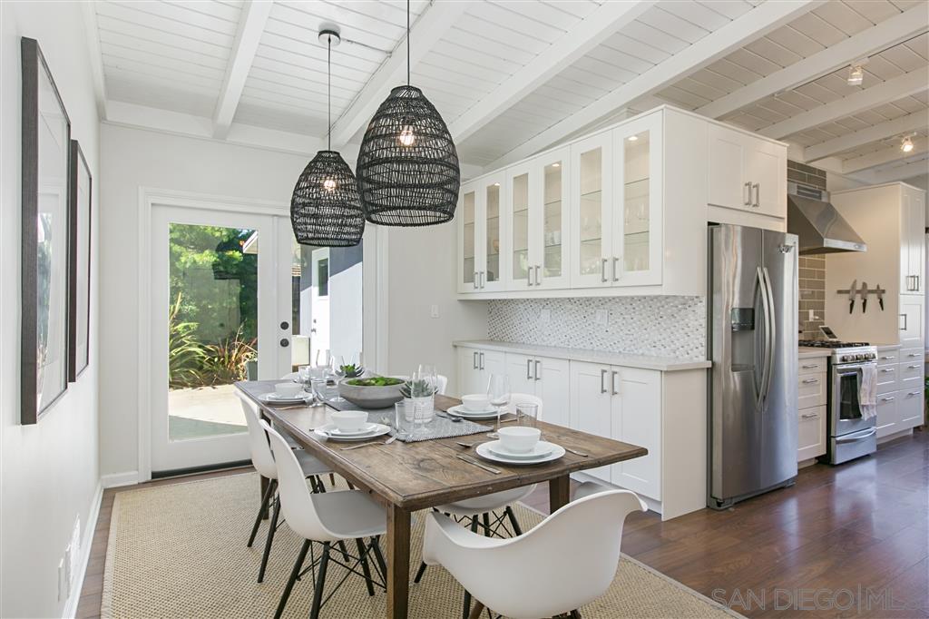 759 Bellevue Place La Jolla, CA 92037 - Photo 5 of 15 a view of a dining room with furniture window and wooden floor