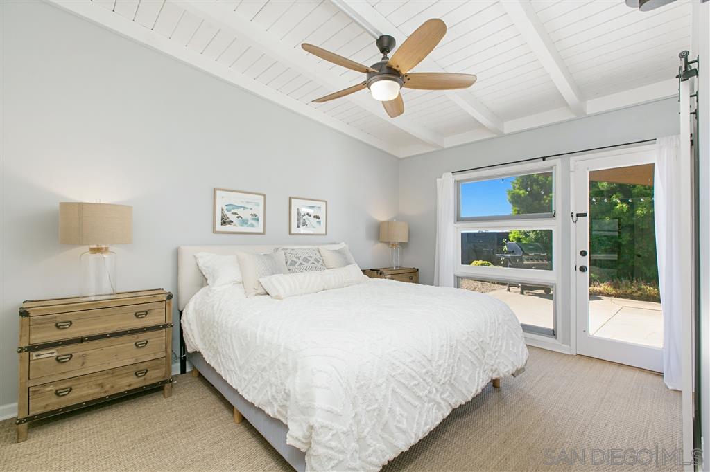 759 Bellevue Place La Jolla, CA 92037 - Photo 6 of 15 a bedroom with a bed and a large window