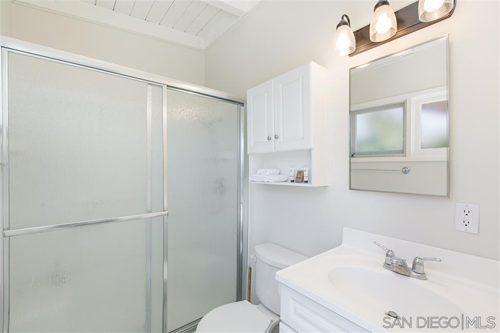 759 Bellevue Place La Jolla, CA 92037 - Photo 7 of 15 a bathroom with a sink and mirror