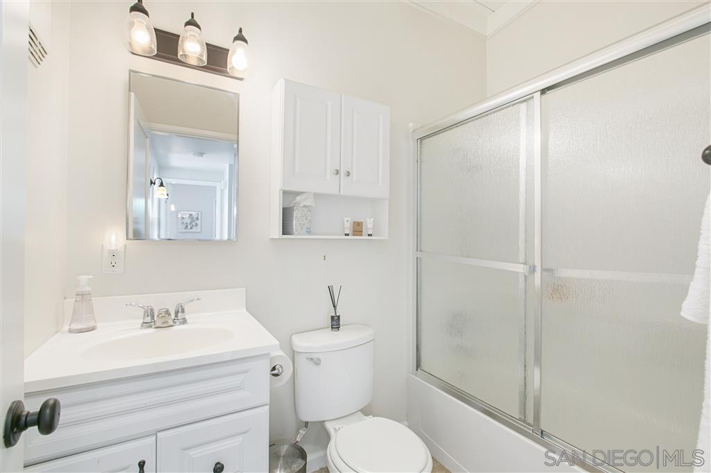 759 Bellevue Place La Jolla, CA 92037 - Photo 10 of 15 a bathroom with a sink a toilet and shower