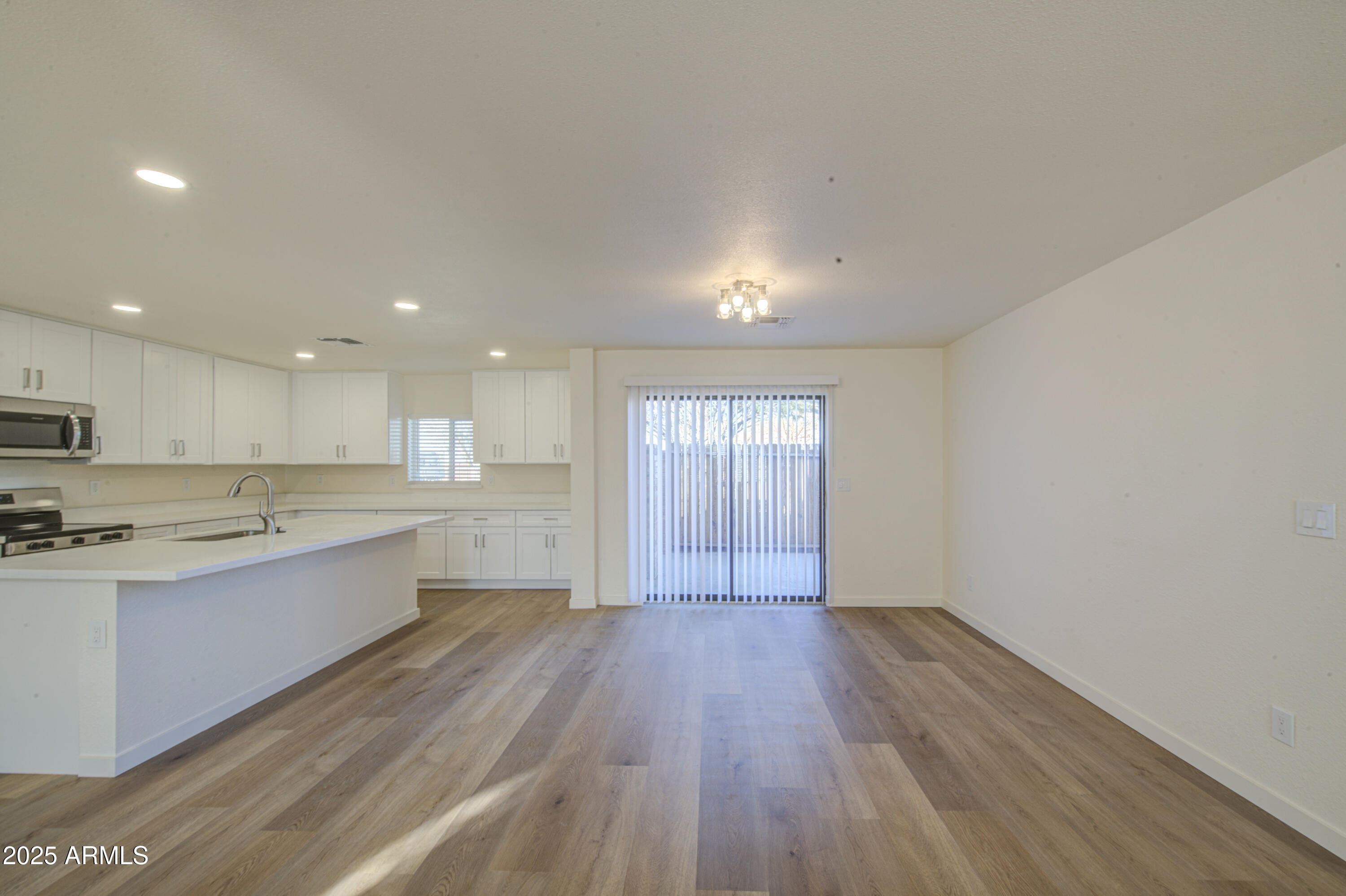 25450 West Clayton Road Casa Grande, AZ 85193 - Photo 16 of 80 a view of kitchen with wooden floor and electronic appliances