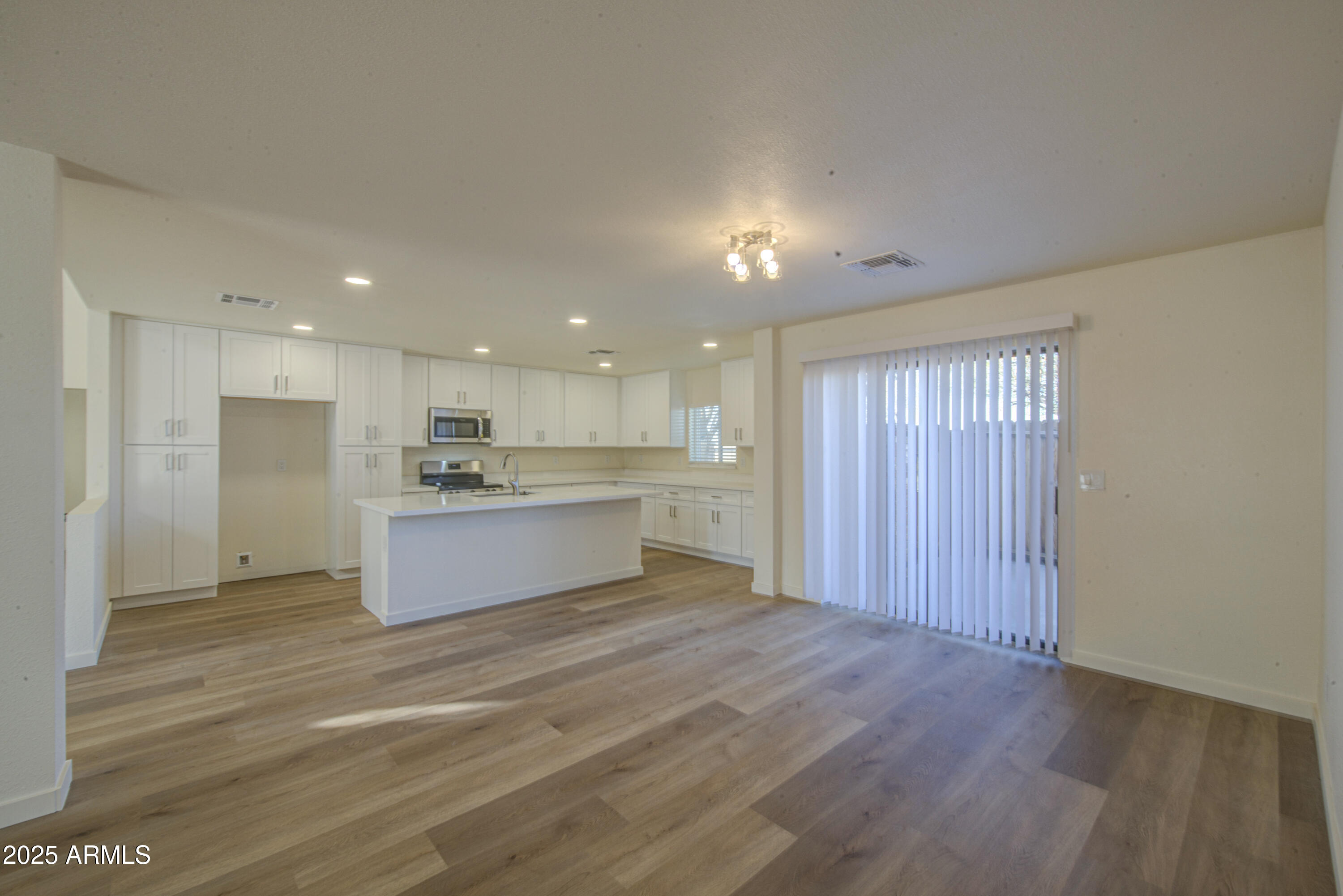 25450 West Clayton Road Casa Grande, AZ 85193 - Photo 17 of 80 a view of kitchen with wooden floor