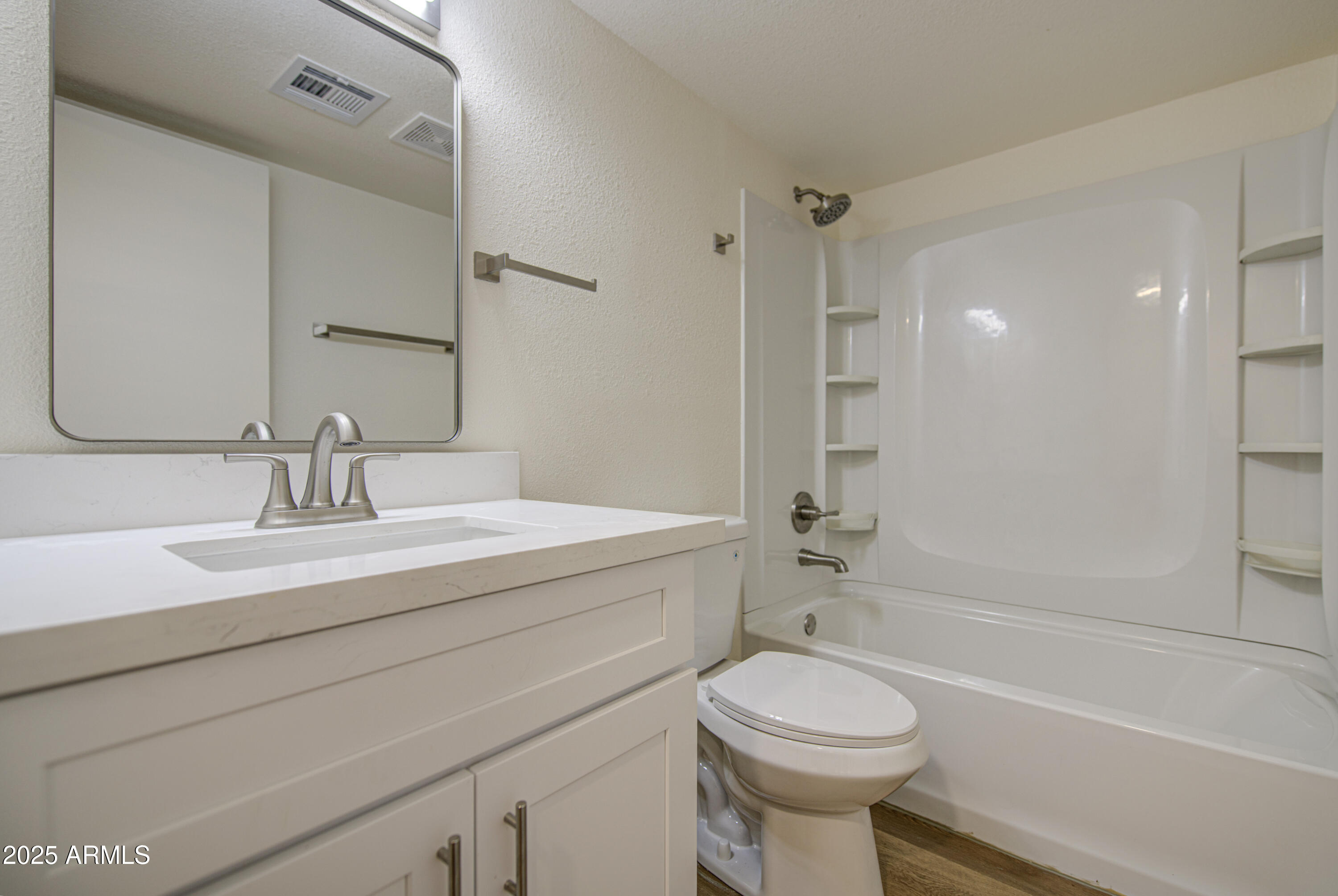 25450 West Clayton Road Casa Grande, AZ 85193 - Photo 41 of 80 a bathroom with a sink a toilet and a bathtub