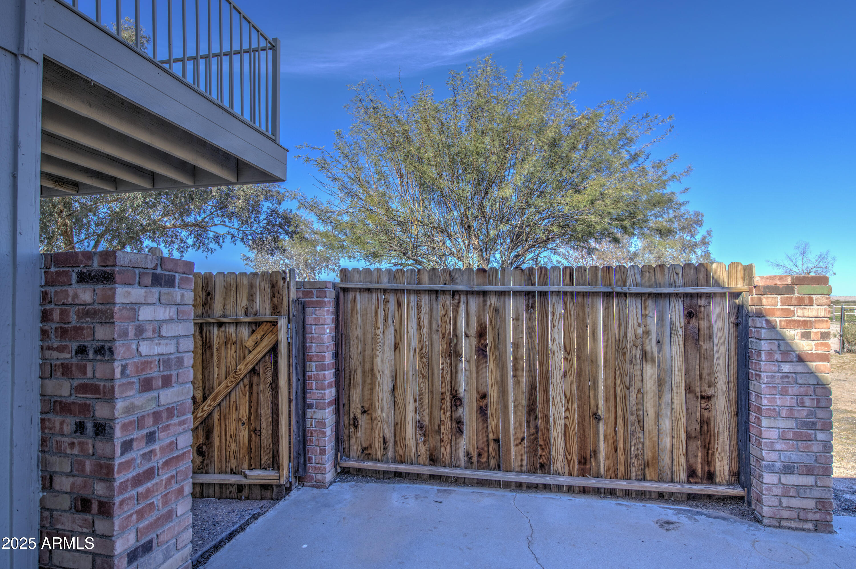 25450 West Clayton Road Casa Grande, AZ 85193 - Photo 45 of 80 a view of a backyard with wooden fence