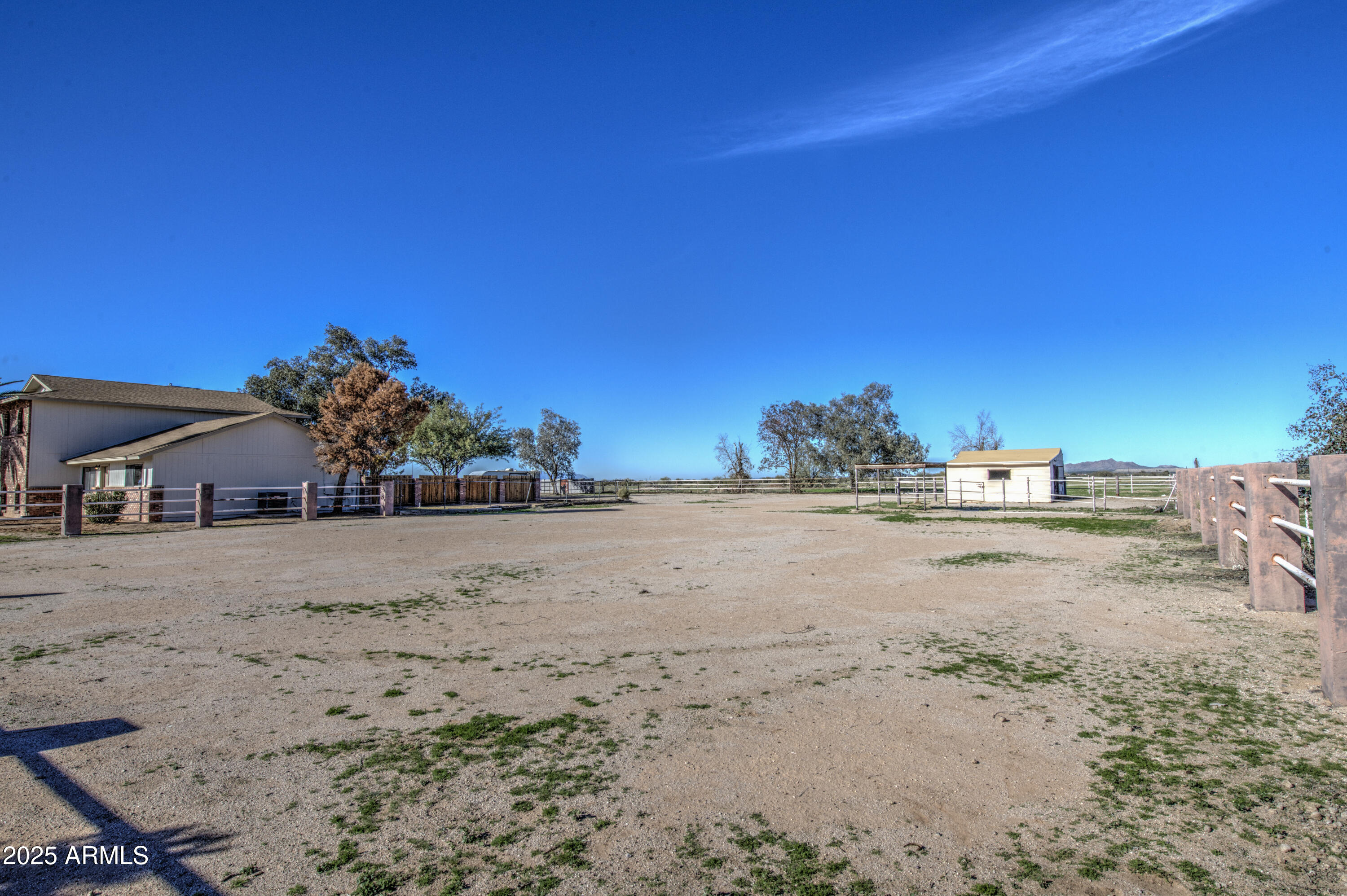 25450 West Clayton Road Casa Grande, AZ 85193 - Photo 48 of 80 a view of a dirt road with a building in the background