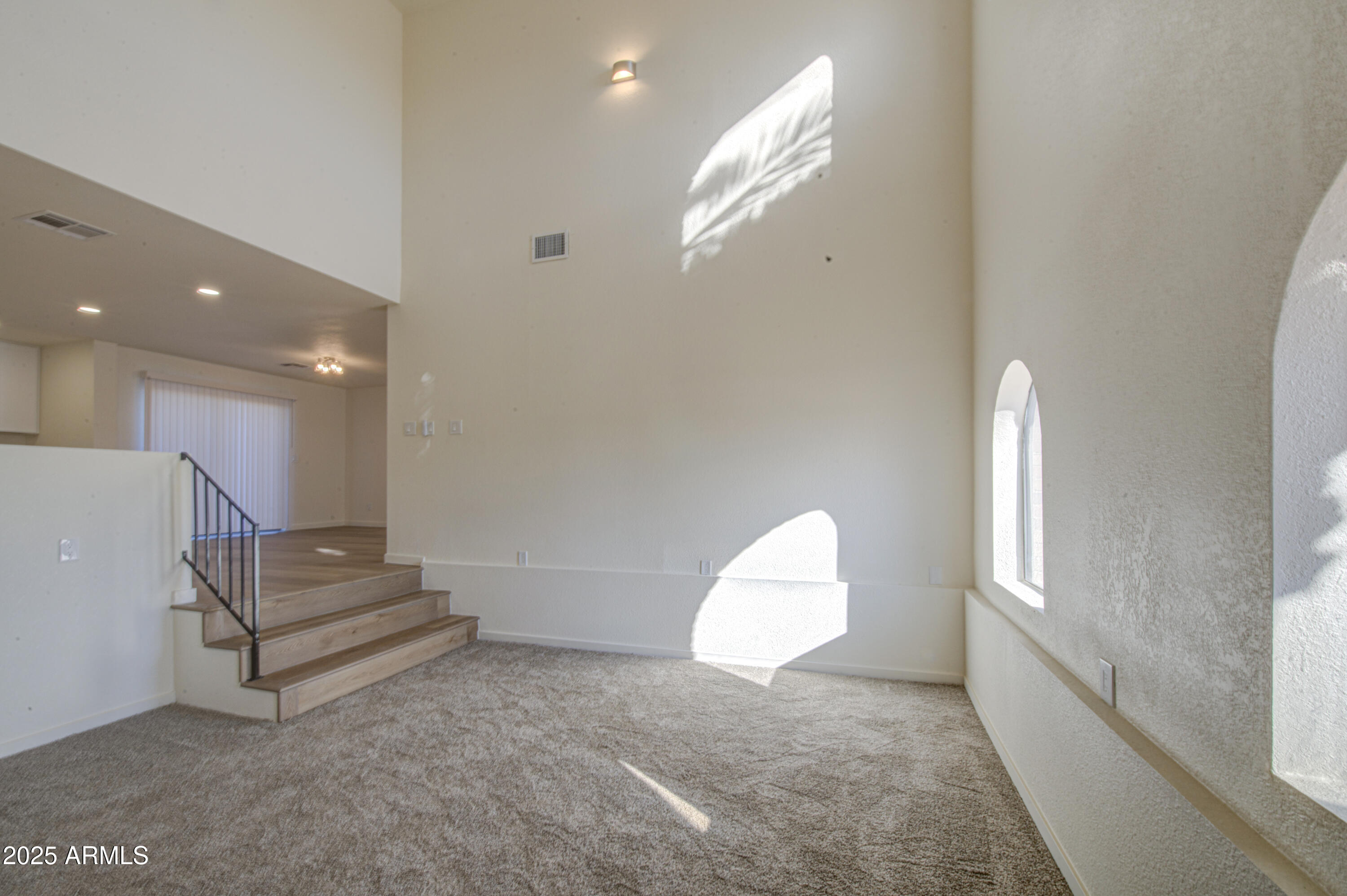 25450 West Clayton Road Casa Grande, AZ 85193 - Photo 7 of 80 a view of an empty room with a window