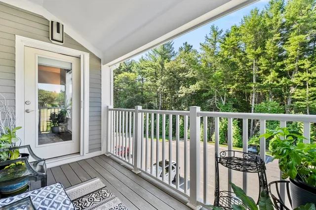 a view of balcony with furniture