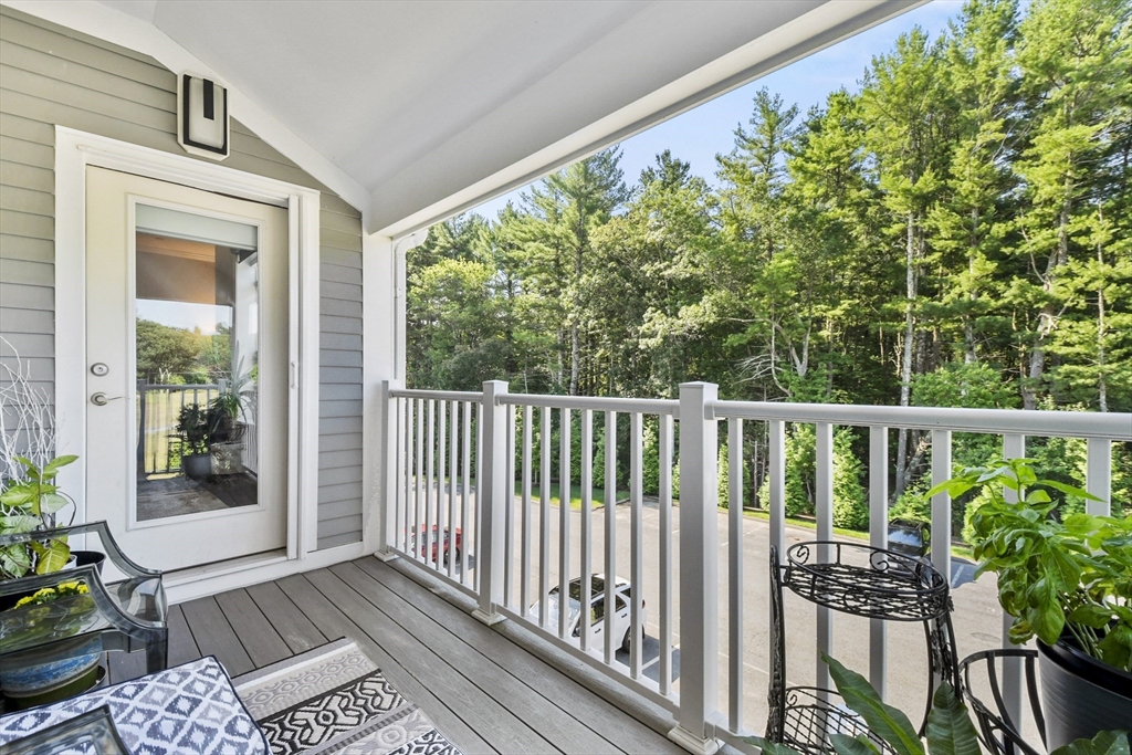 635 Old Post Road, Unit 303 Sharon, MA 02067 - Photo 15 of 33 a view of balcony with furniture