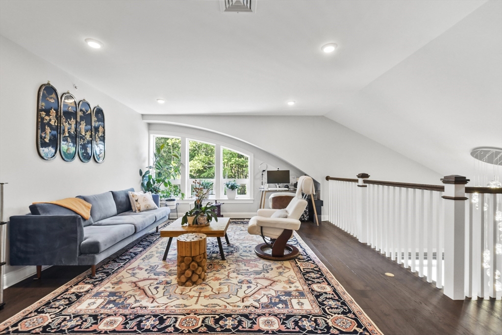 635 Old Post Road, Unit 303 Sharon, MA 02067 - Photo 27 of 33 a living room with furniture and a large window