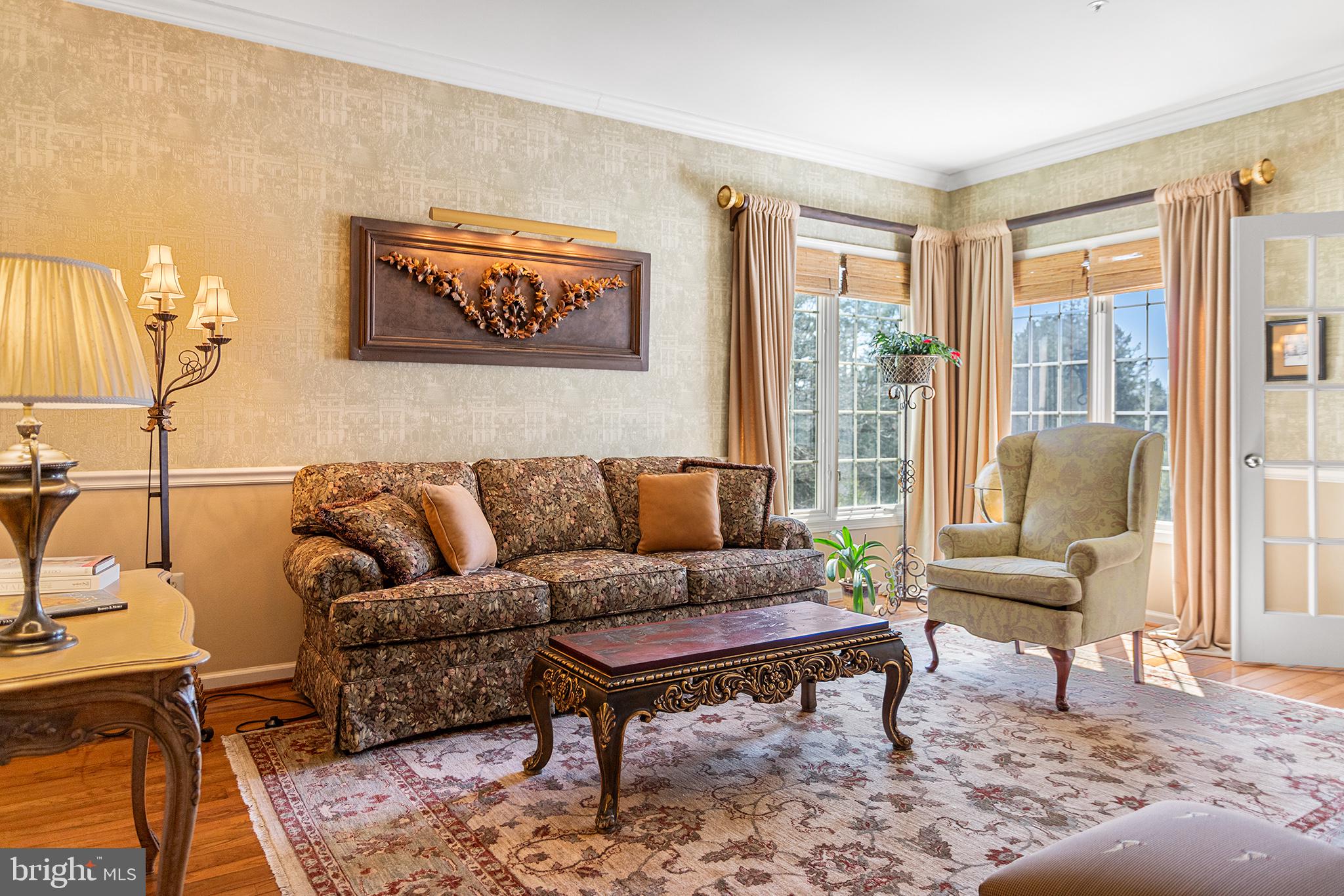 16 Riders Run Newtown Square, PA 19073 - Photo 6 of 49 a living room with furniture a rug and a large window