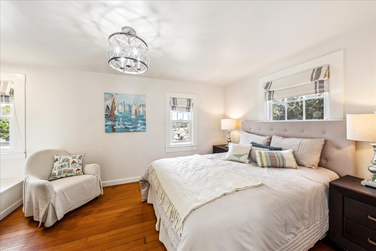 799 Grace Street Monterey, CA 93940 - Photo 12 of 38 a bedroom with a bed and a couch