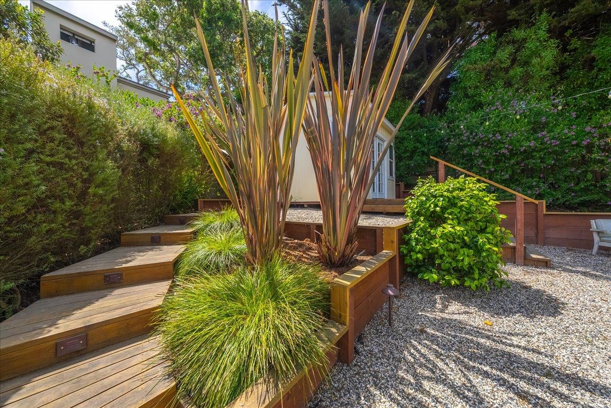 799 Grace Street Monterey, CA 93940 - Photo 20 of 38 a backyard of a house with lots of green space