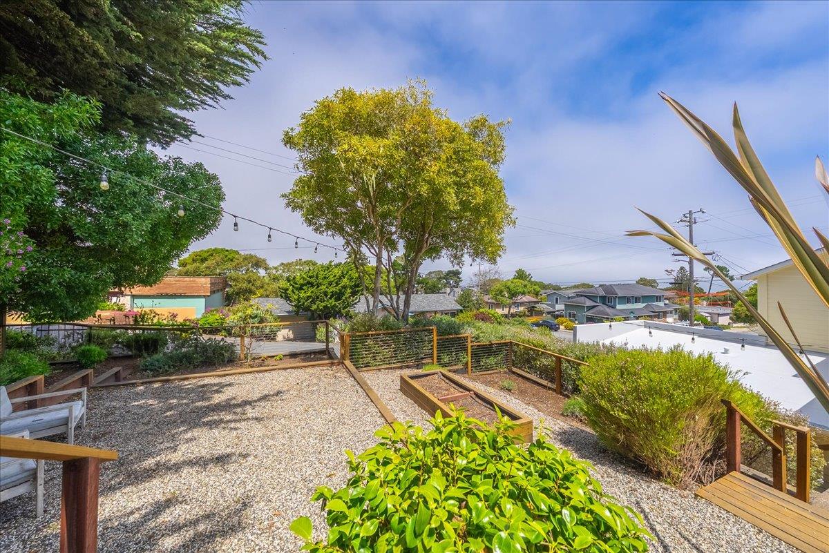 799 Grace Street Monterey, CA 93940 - Photo 24 of 38 a view of a backyard with a patio