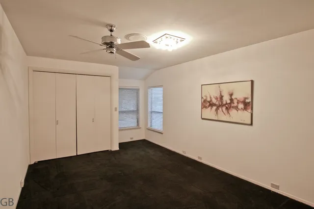 a view of a living room and entryway