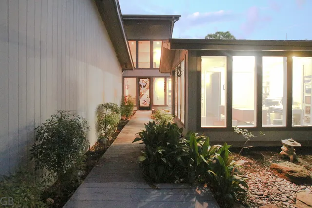 a house view with a outdoor space