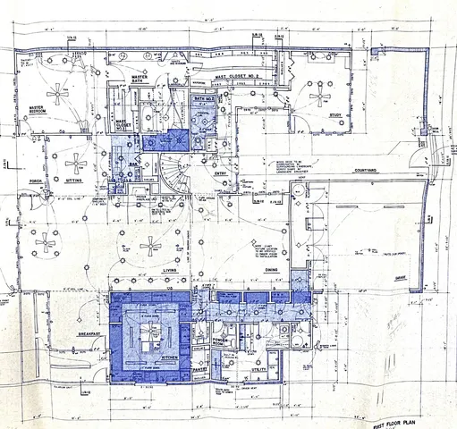 a black and white photo of a living room