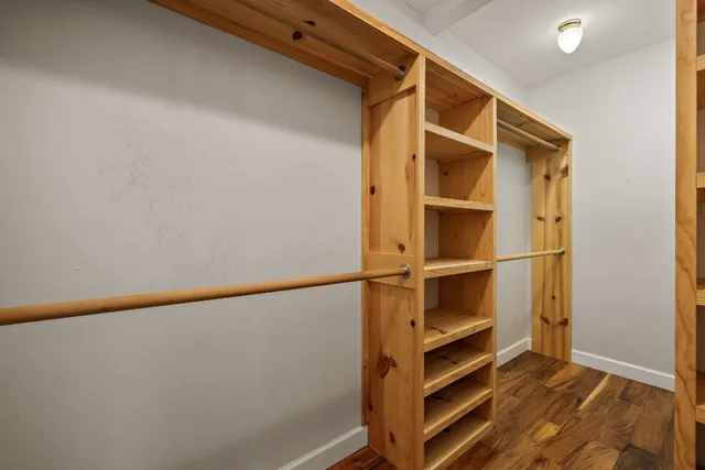 a view of an empty walk in closet