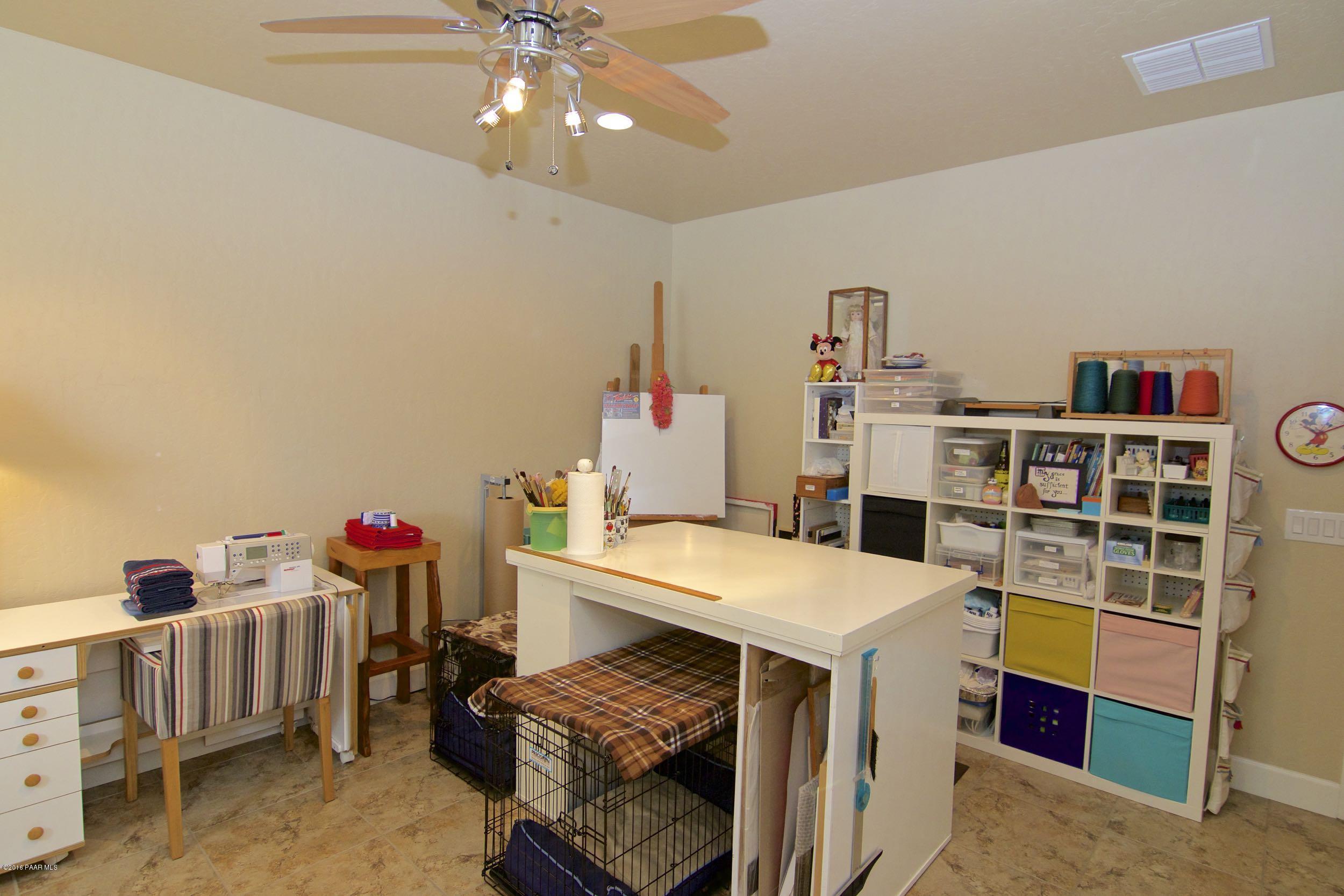 1157 Rusty Nail Road Prescott Valley, AZ 86314 - Photo 11 of 45 a room with furniture a washer and dryer