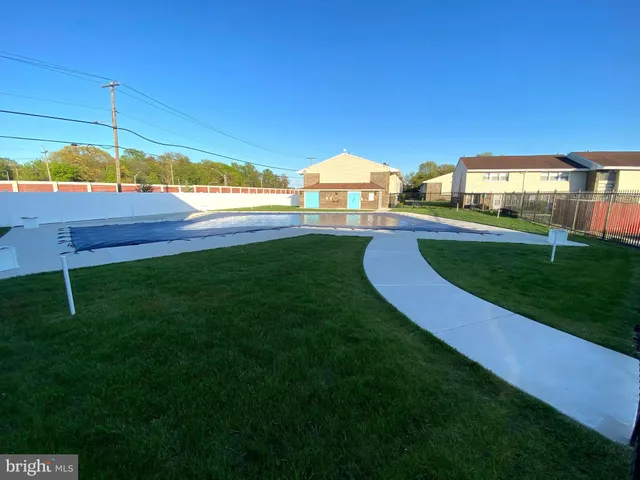 a view of a house with a big yard