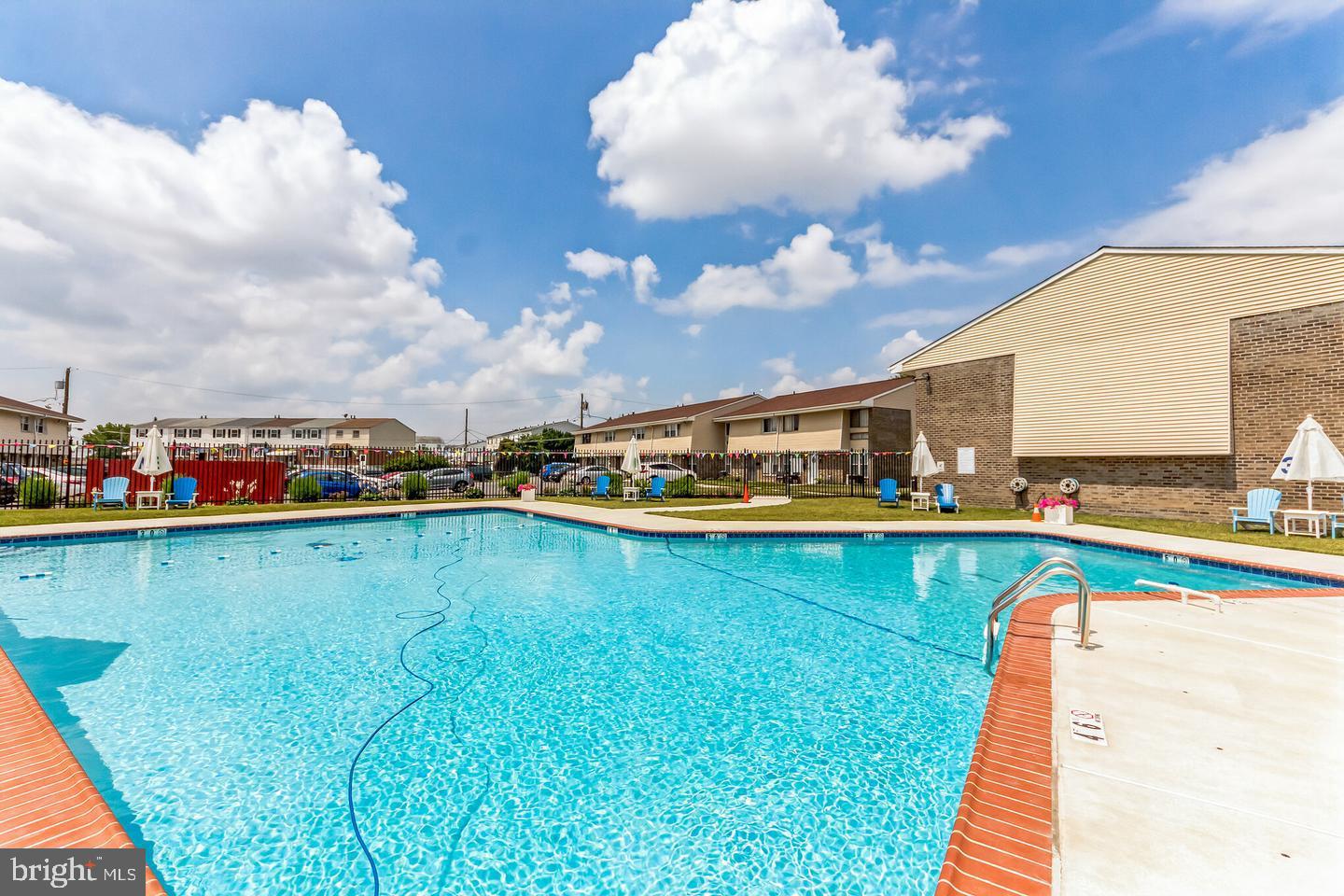 3850 Woodhaven Road, Unit 1012 Philadelphia, PA 19154 - Photo 16 of 16 a view of a swimming pool with an outdoor seating