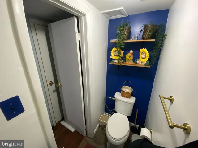 a bathroom with a toilet and a sink