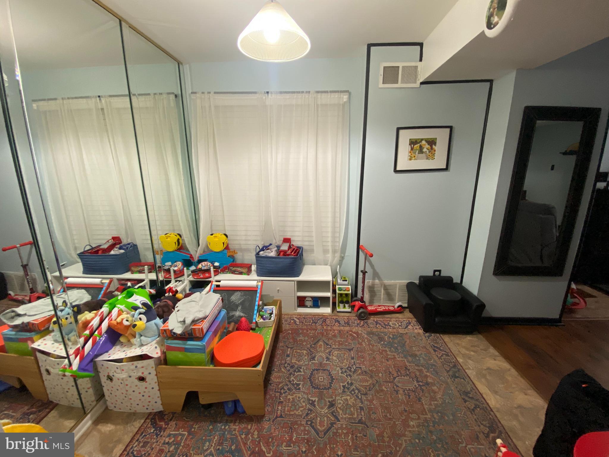 3850 Woodhaven Road, Unit 1012 Philadelphia, PA 19154 - Photo 7 of 16 a room with musical instruments