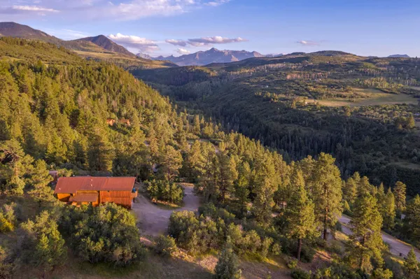 a view of a city with mountains in the background