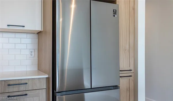 a view of kitchen with wooden floor