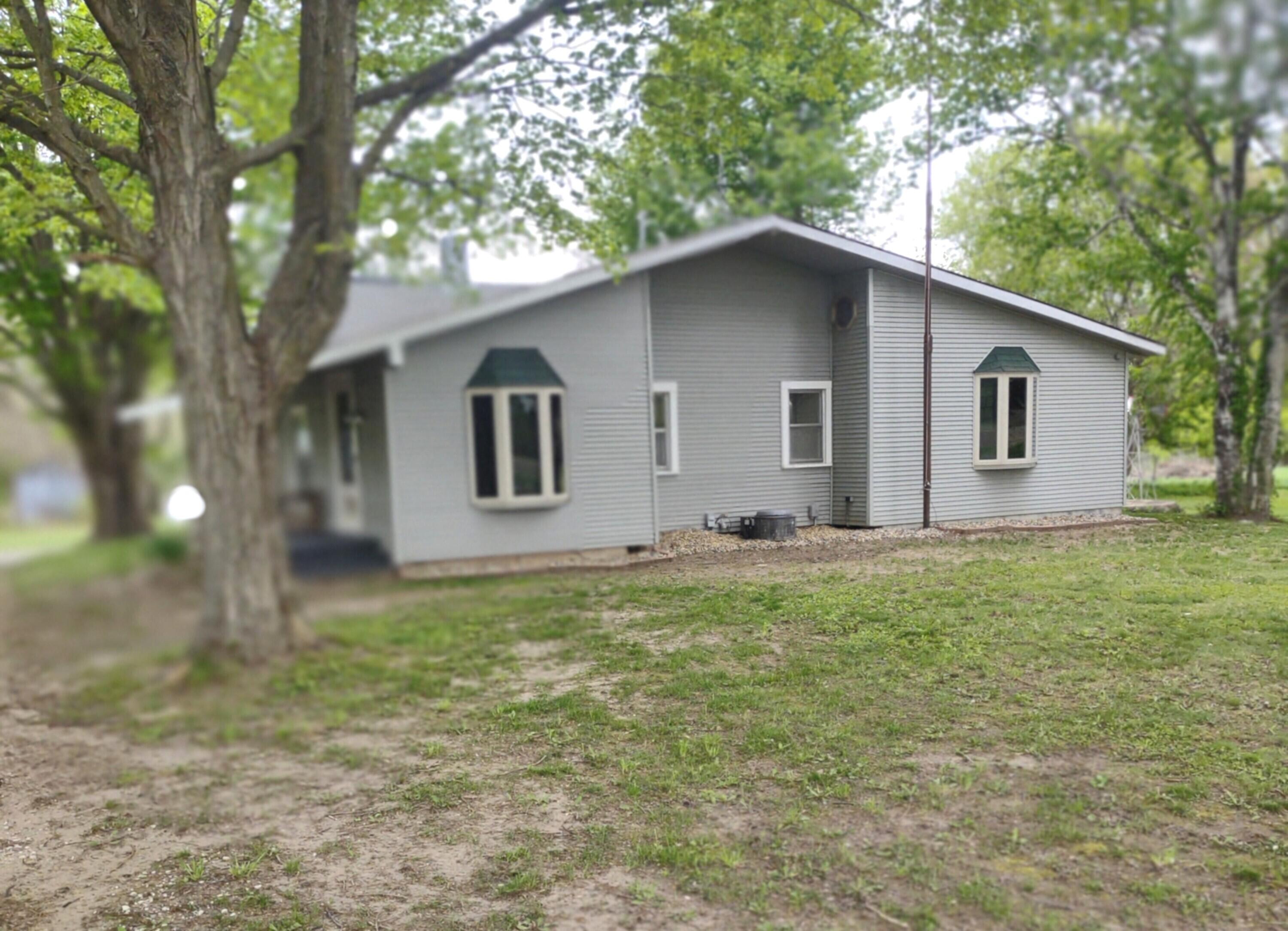 6667 6 1/2 Mile Road East Leroy, MI 49051 - Photo 1 of 22 front view