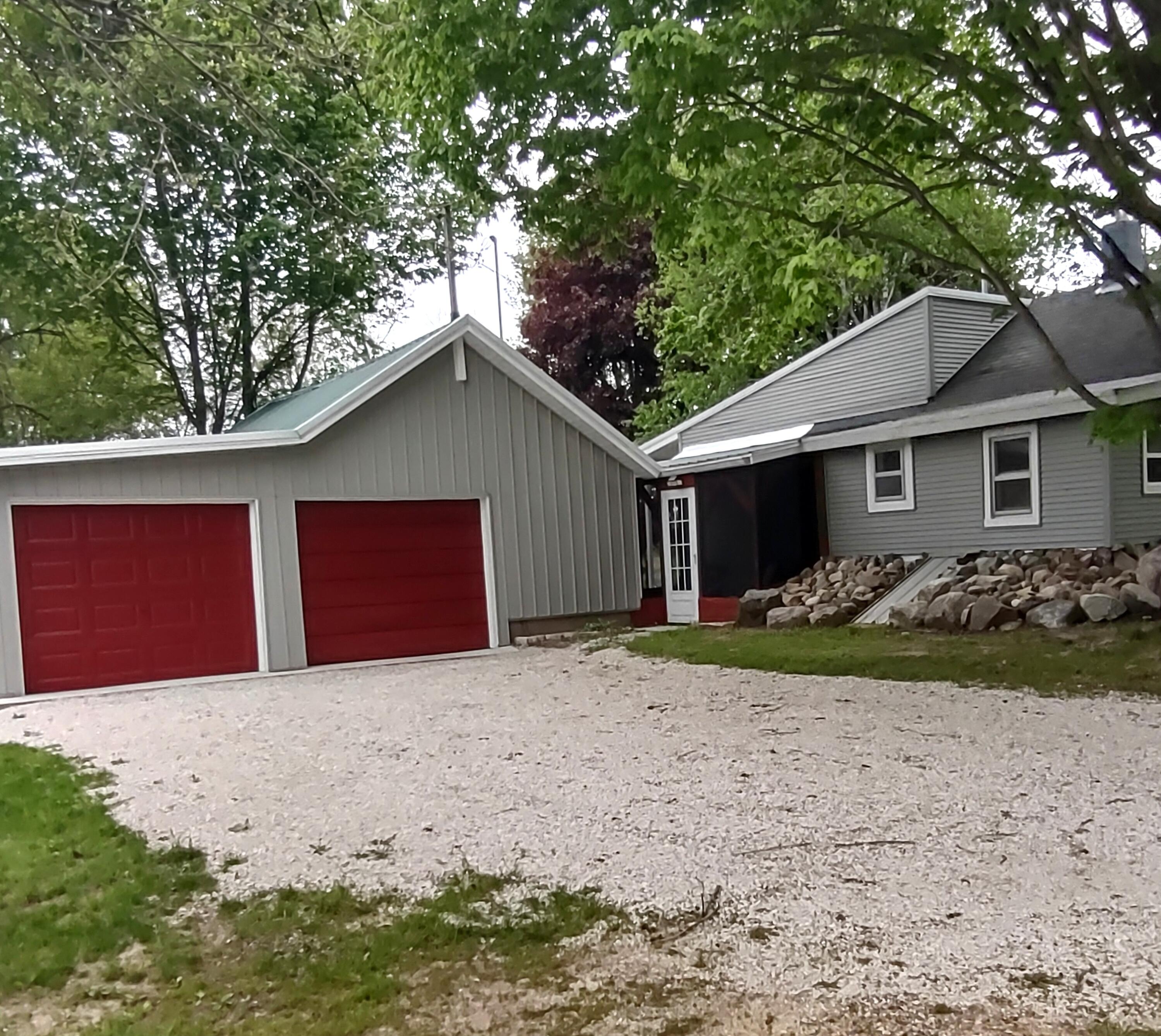 6667 6 1/2 Mile Road East Leroy, MI 49051 - Photo 4 of 22 Six and one half mile rd. garage view