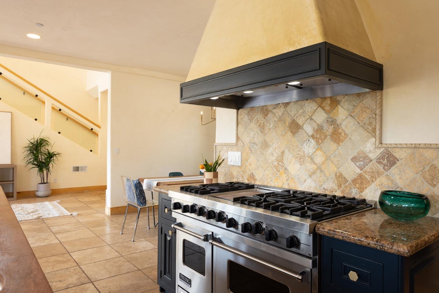 175 Chaparral Road Carmel Valley, CA 93924 - Photo 13 of 40 a kitchen with a stove and a shower