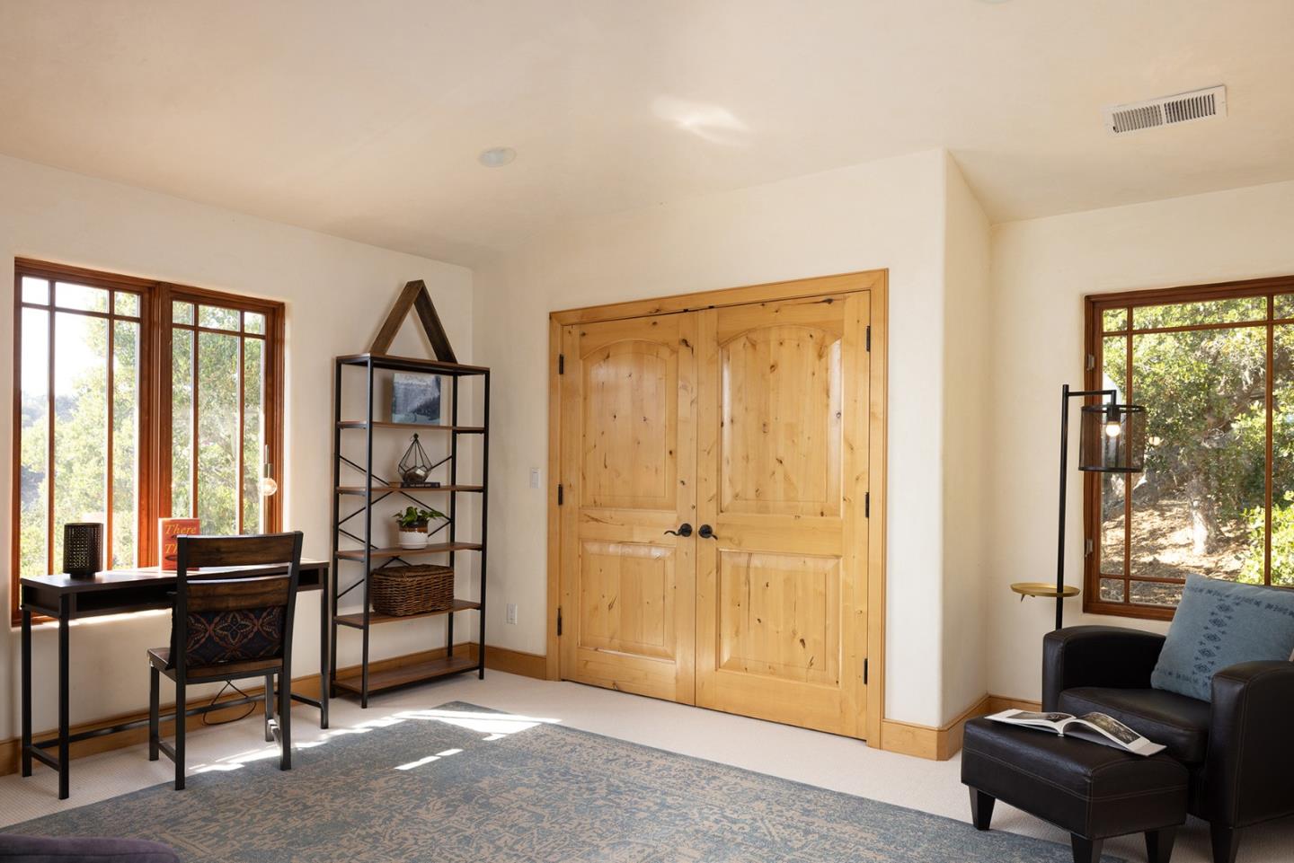 175 Chaparral Road Carmel Valley, CA 93924 - Photo 32 of 40 a living room with furniture and a window