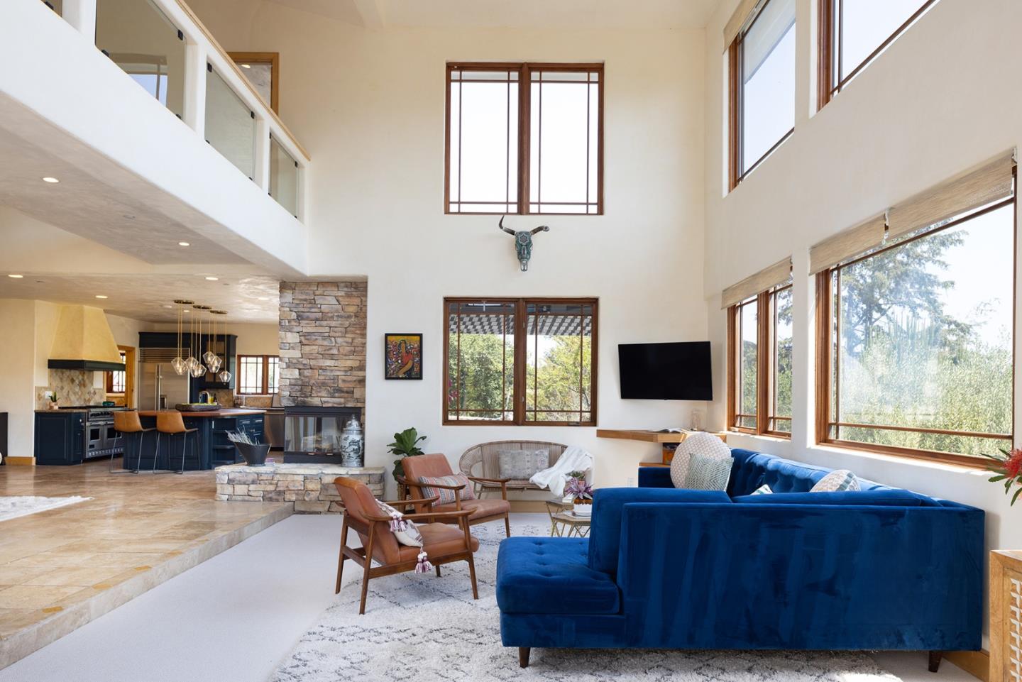 175 Chaparral Road Carmel Valley, CA 93924 - Photo 4 of 40 a living room with furniture and a large window
