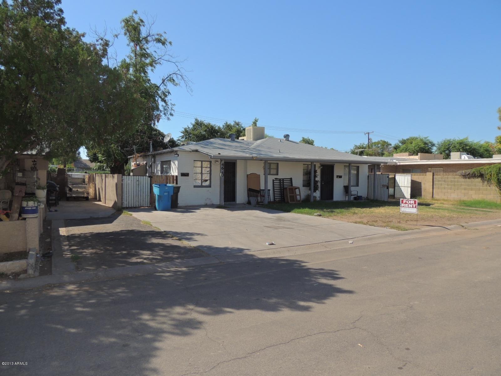 4620 North 10th Place Phoenix, AZ 85014 - Photo 4 of 19 a front view of a house with a lake view