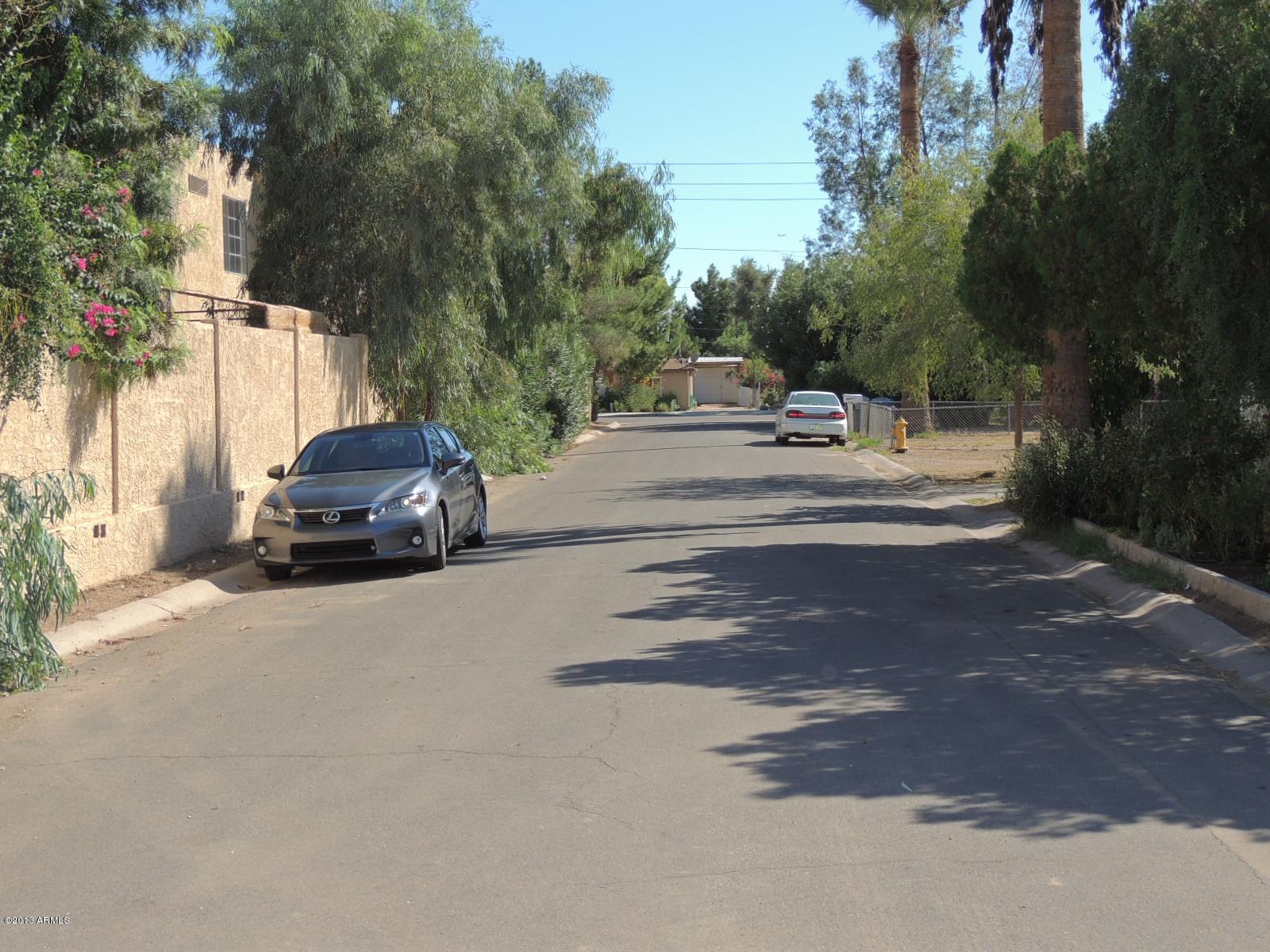 4620 North 10th Place Phoenix, AZ 85014 - Photo 8 of 19 a car parked on the side of the road